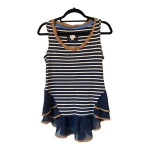 Anthropologie women’s sleeveless top with  flared ruffled bottom and unique trim
